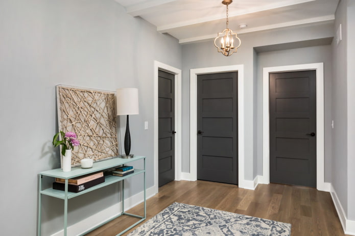 gray doors with brown floor in the interior