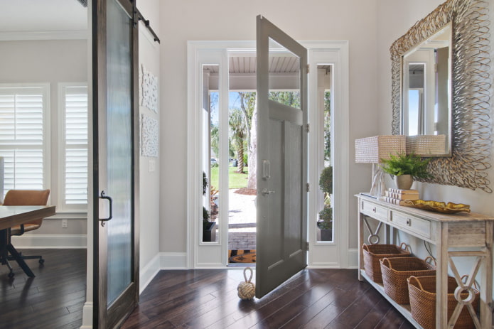 gray door with wenge flooring in the interior