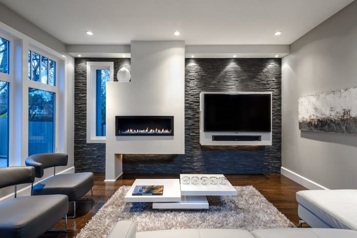 living room interior with an accent dark wall made of decorative slate