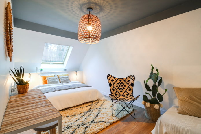 gray ceiling structure with a chandelier