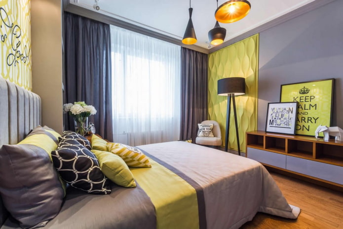yellow accent wall in a gray bedroom