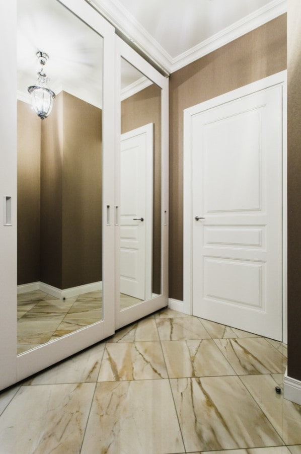 white sliding wardrobe in the hallway