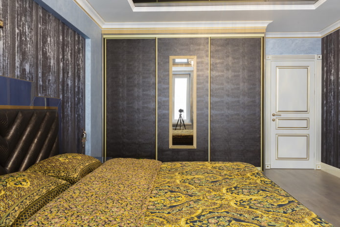 sliding wardrobe with leather facade trim in the bedroom