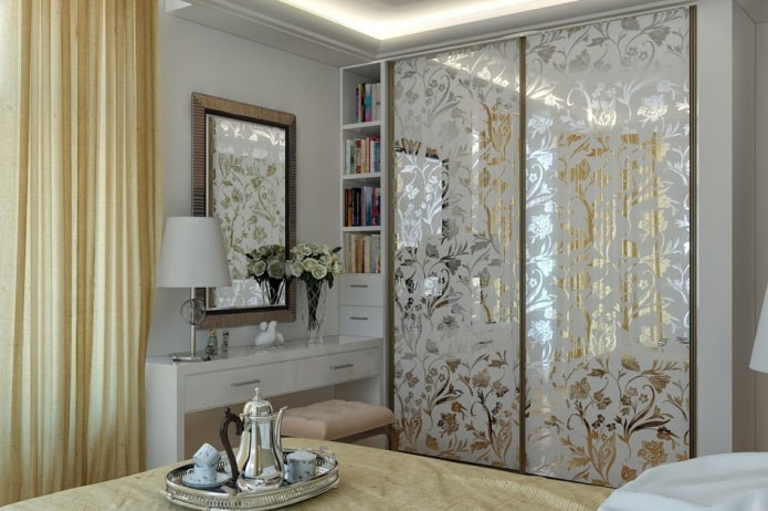 wardrobe with mirrored façade in the bedroom interior