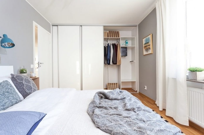 wardrobe in the interior of a Scandinavian-style bedroom