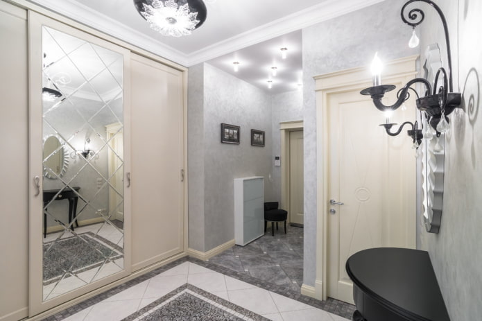 Mirror on the facades of the wardrobe