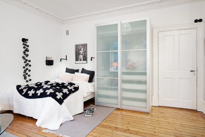 A compartment wardrobe with transparent doors