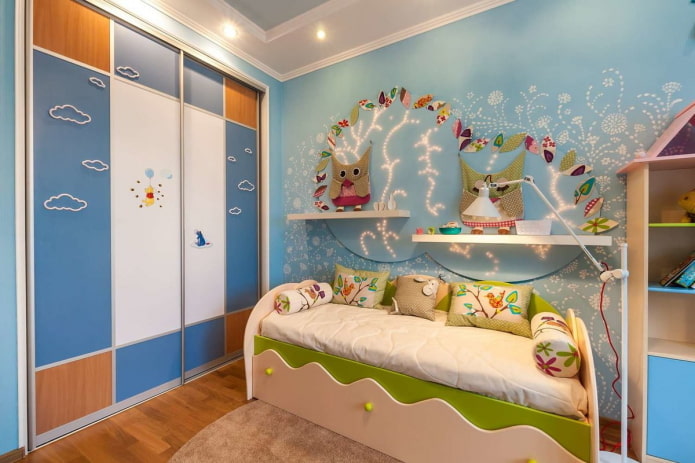 Sliding wardrobe in the interior of the children's room