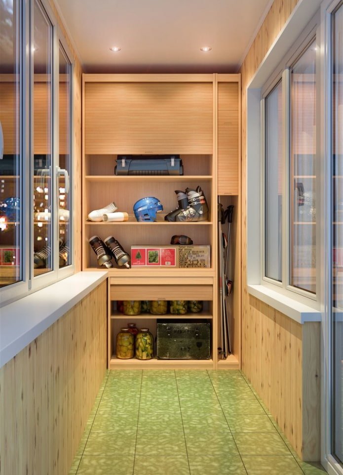 Cans and sports equipment in the cabinet