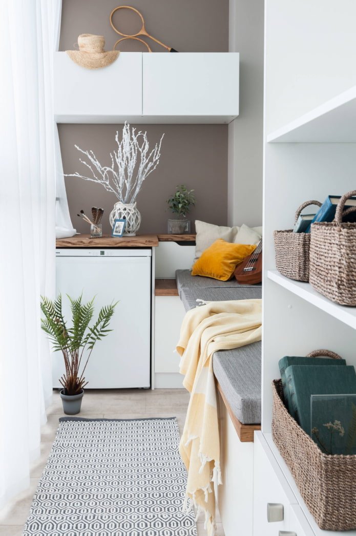 Mini-room on the balcony with cabinets