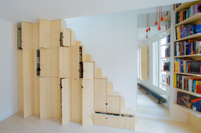 wardrobe with hinged doors under the staircase