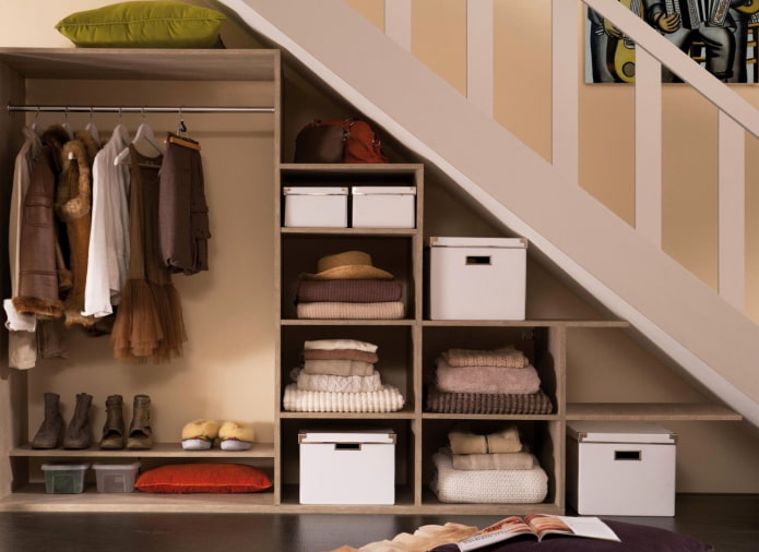 built-in open wardrobe under the staircase