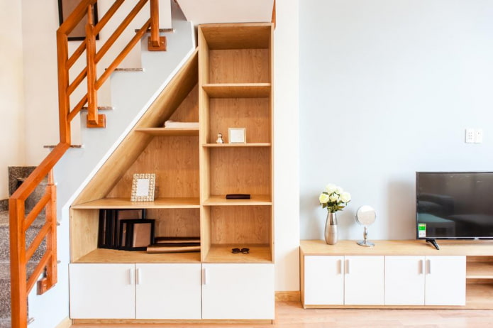 wardrobe under the staircase in the interior