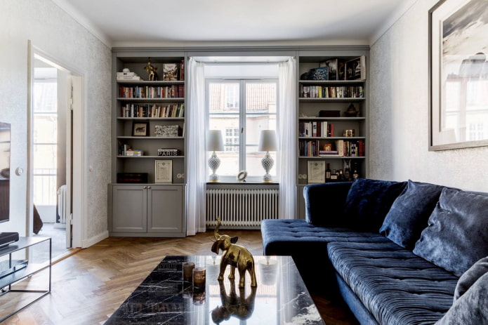 wardrobe around the window in the interior of the hall