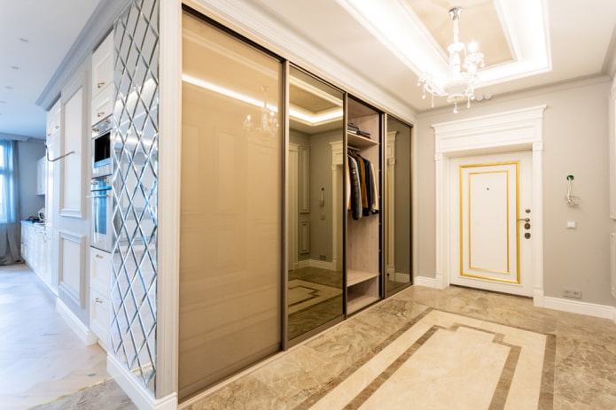 filling a sliding wardrobe in a hallway interior
