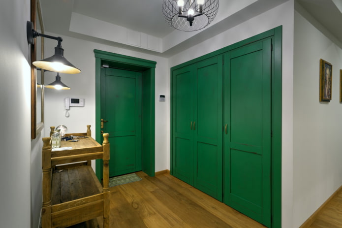green wardrobe in the interior of the hallway