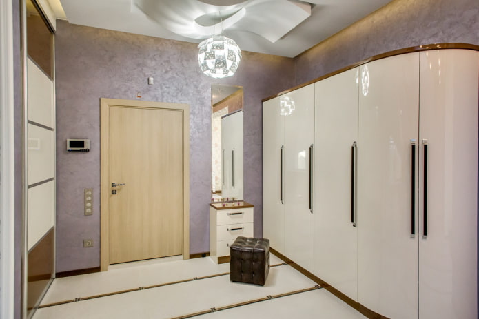wardrobe with a beveled corner in the hallway interior