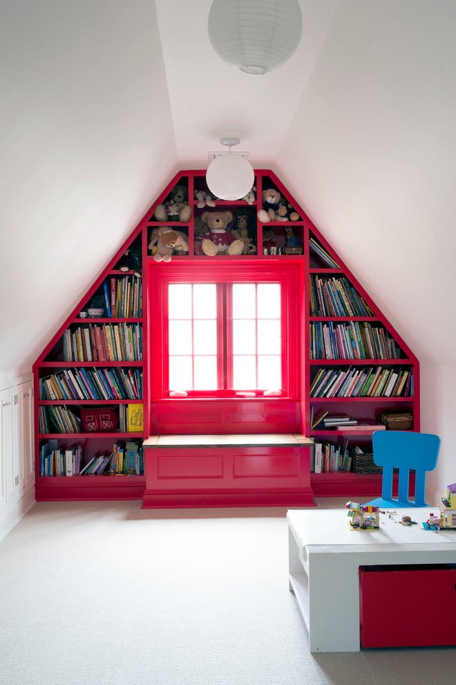wardrobe near the window in the attic interior