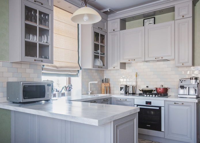 cabinets near the window in the kitchen interior