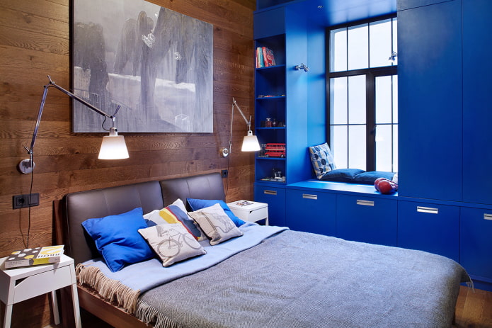 cabinets around the window in the bedroom interior