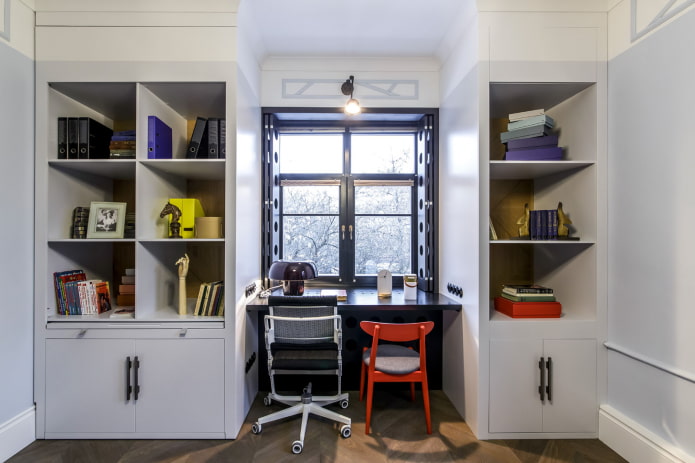 wardrobes on both sides of the window in the interior