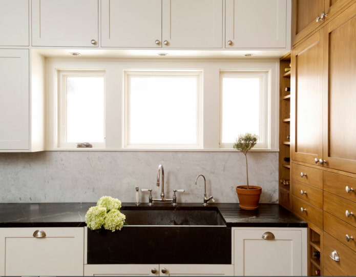 wardrobe above the window in the interior