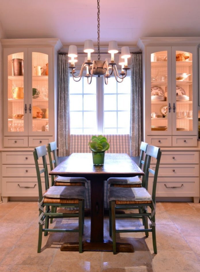 cabinets near the window in the kitchen interior