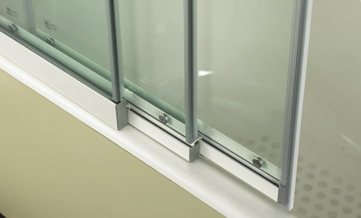 Glass sliding partition for the bathroom