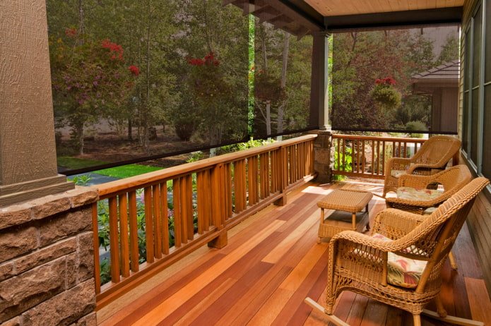 veranda with transparent roller blinds