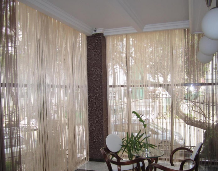 thread curtains on the loggia
