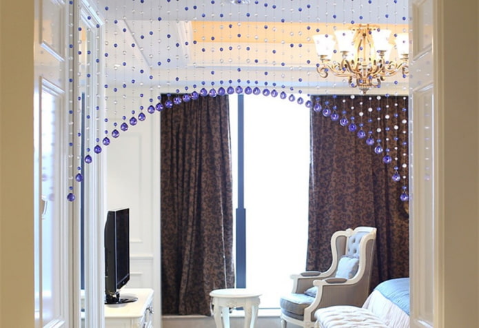 curtains made of beads on the door in the interior
