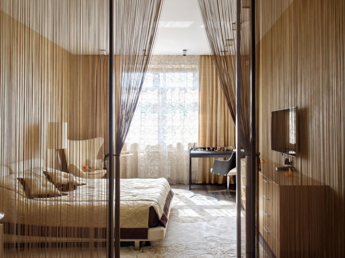 thread curtains on the door in the interior