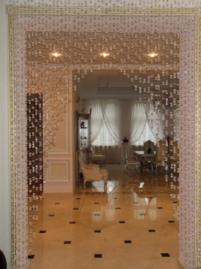 thread curtains on the doorway