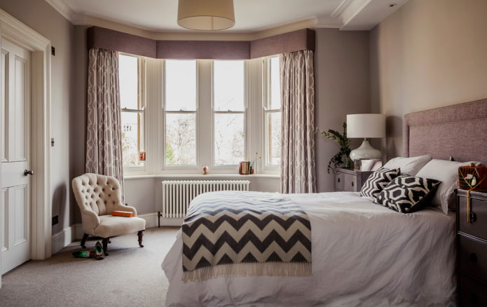 curtains with a hard lambrequin on a bay window