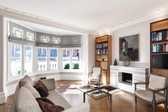 gray roller blinds on a bay window