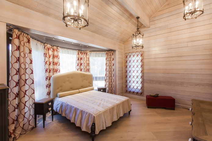 curtains on a bay window in a wooden house