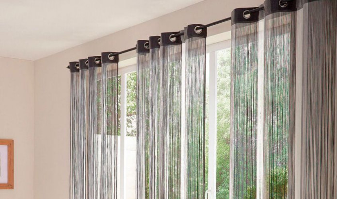 Thread curtains on eyelets
