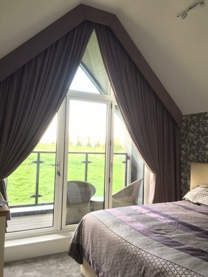 curtains on the dormer windows in the bedroom