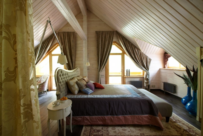 curtains on dormer windows with a slanted ceiling