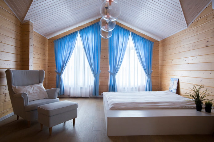 roof windows with blue curtains