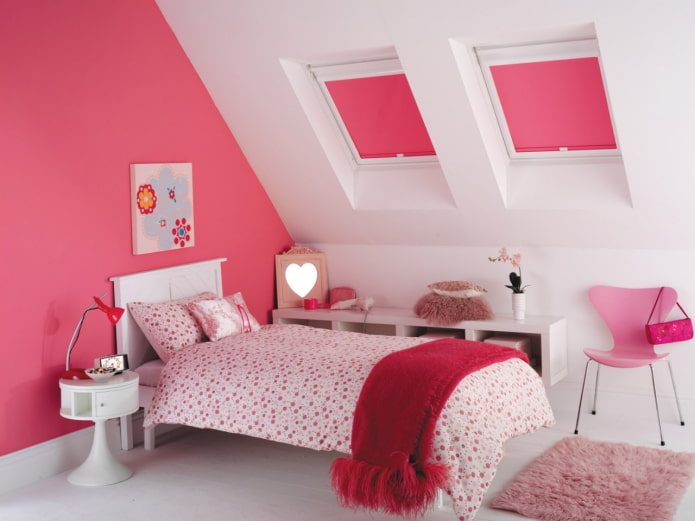 roof windows with pink roller blinds
