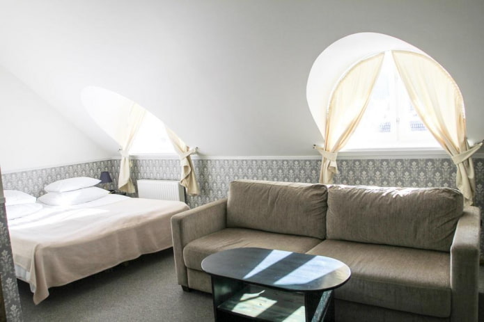 arched windows with curtains in the interior