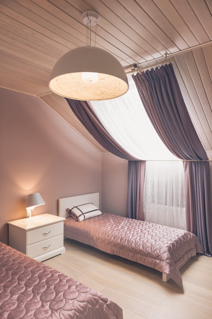 curtains on the dormer window with a bevel