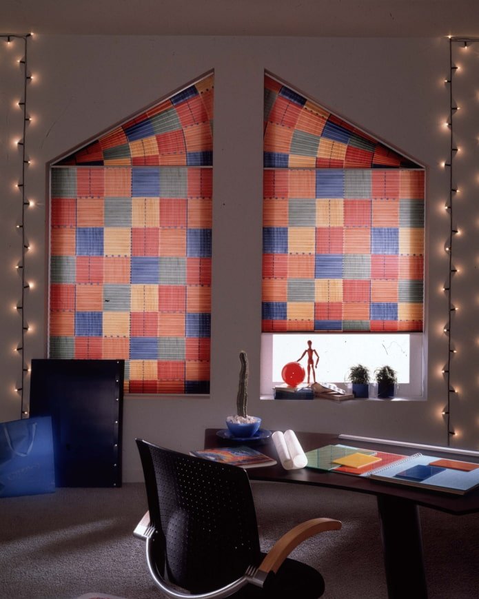 pleated blinds with geometric patterns on the roof window