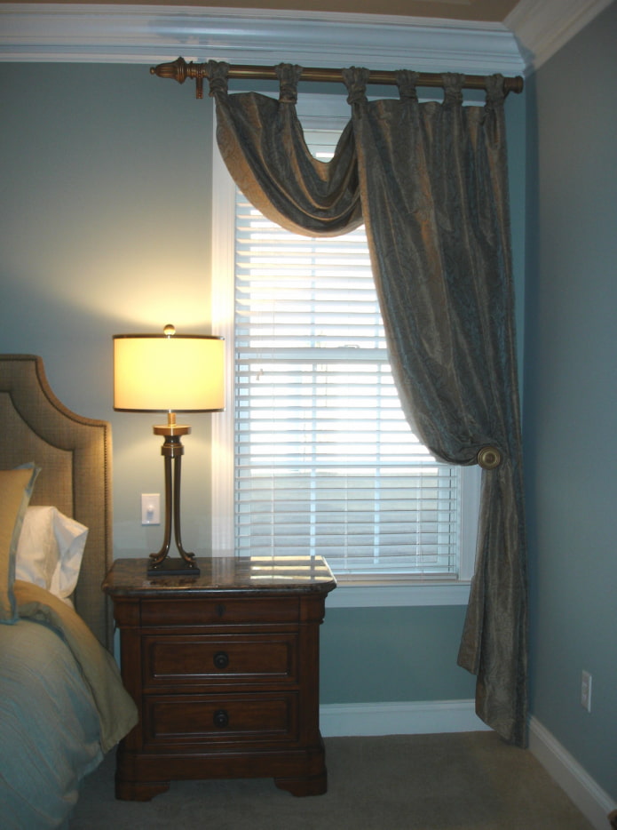 asymmetrical curtain in the bedroom