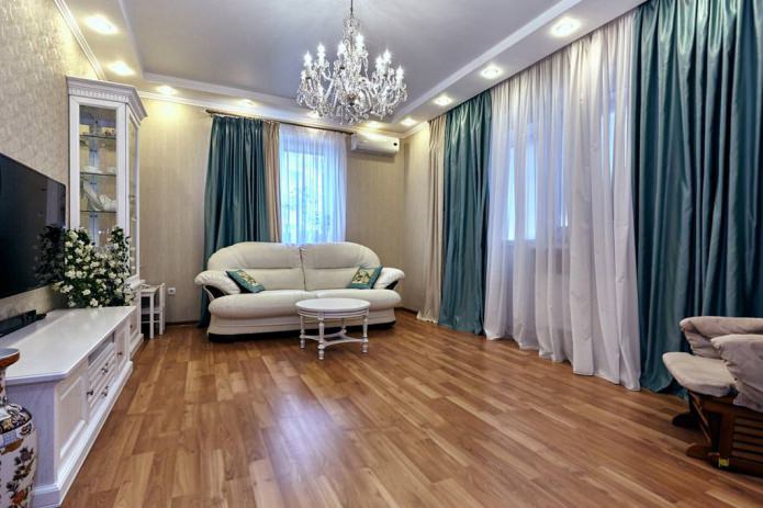 Turquoise curtains in the living room interior