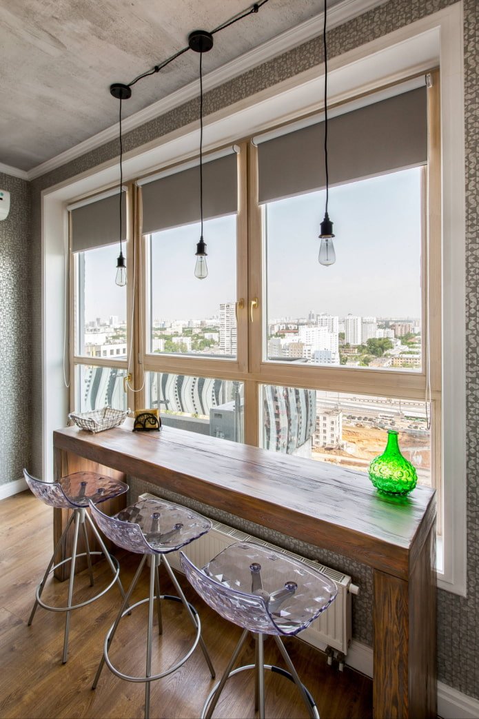 Roller blinds in a loft-style kitchen