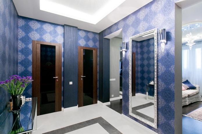 blue wallpaper in the hallway
