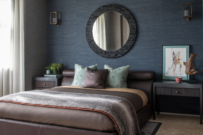 bedroom with blue plain wallpaper