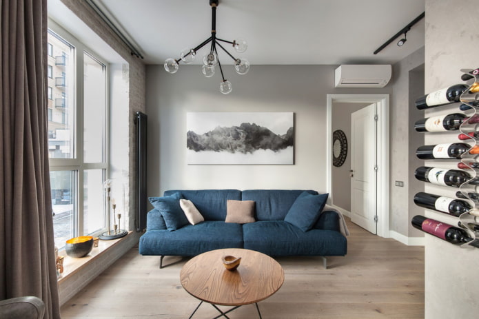 blue sofa in combination with walls